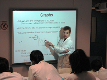 A member of staff in the School of Pharmacy usaing an interactive whiteboard
